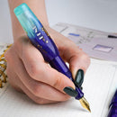 BENU Pixie Twilight Lagoon Fountain Pen - A Hand Writing On Paper | EndlessPens