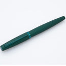 Diplomat Viper Green Rollerball Pen - Pen Leaning Left On White Background | EndlessPens