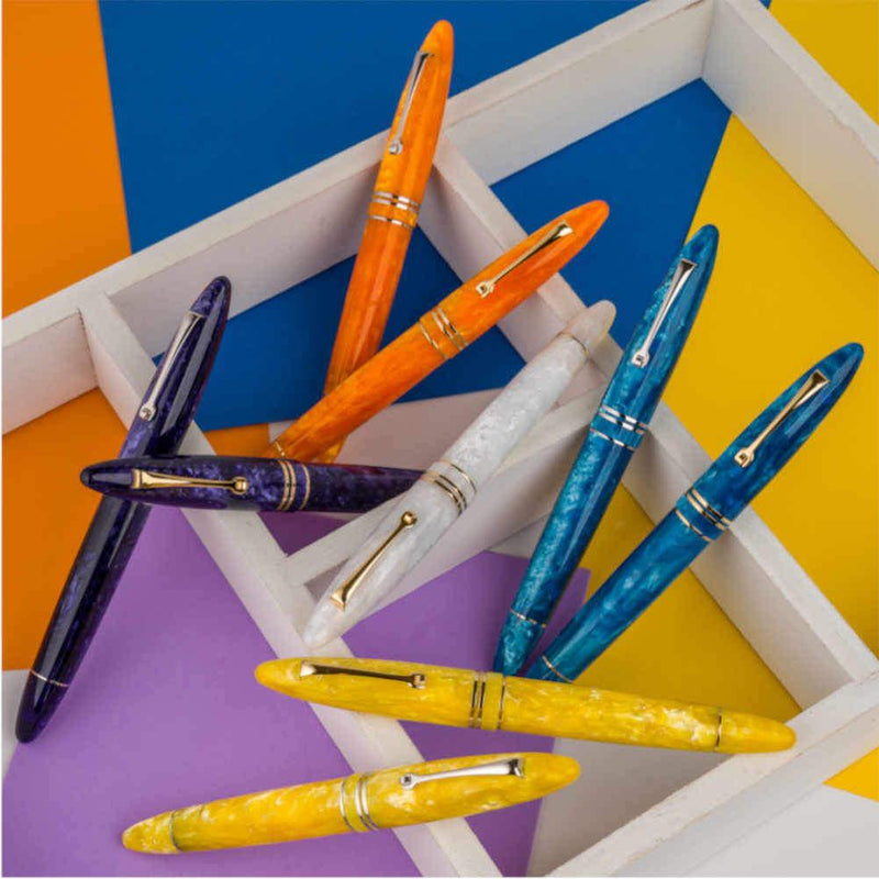 Leonardo Fountain Pen - Furore (Stainless Steel) - Group of Pens on a Colorful Background