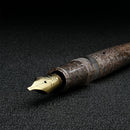 Leonardo Momento Magico Sea Sand Fountain Pen (Stainless Steel) - Nib Exposed Nib On Dark Background | EndlessPens