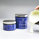 Private Reserve Ink Ink Zero Hand Ink Remover - Two Bottles with A Hand Pouring An Ink Remover | EndlessPens