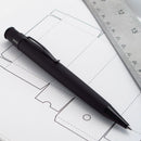 Retro 51 Tornado Vintage Metalsmith Stealth Rollerball Pen (With Ruler and Paper on Background)