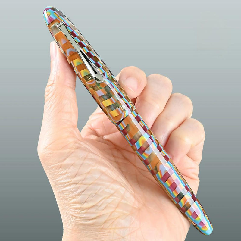 CYPRESS Cellulose Acetate Colorful-CE053 Fountain Pen - A Pen Being Held By Hand | EndlessPens
