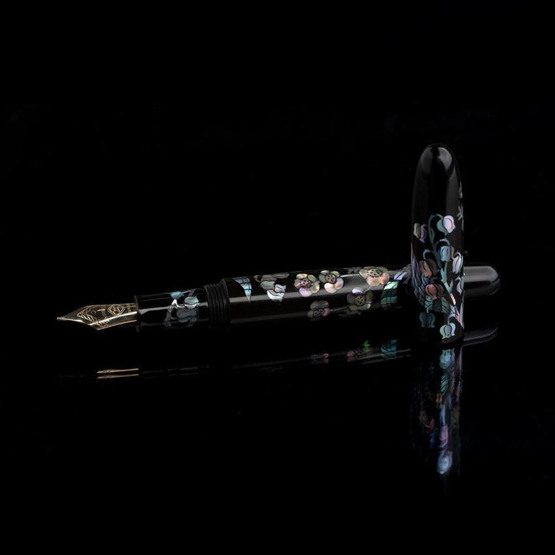 CYPRESS × @micahfinds Victorian Flora: Lily of the Valley's Invitation (14K Gold) Fountain Pen in Black Background | EndlessPens