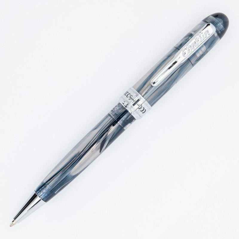 Conklin Symetrik Blue Supernova Ballpoint Pen - Pen Leaning Left on White Background | EndlessPens