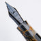 Conklin Mark Twain Crescent Orange Medley with Gunmetal Fountain Pen - Pen Nib Close Up | EndlessPens