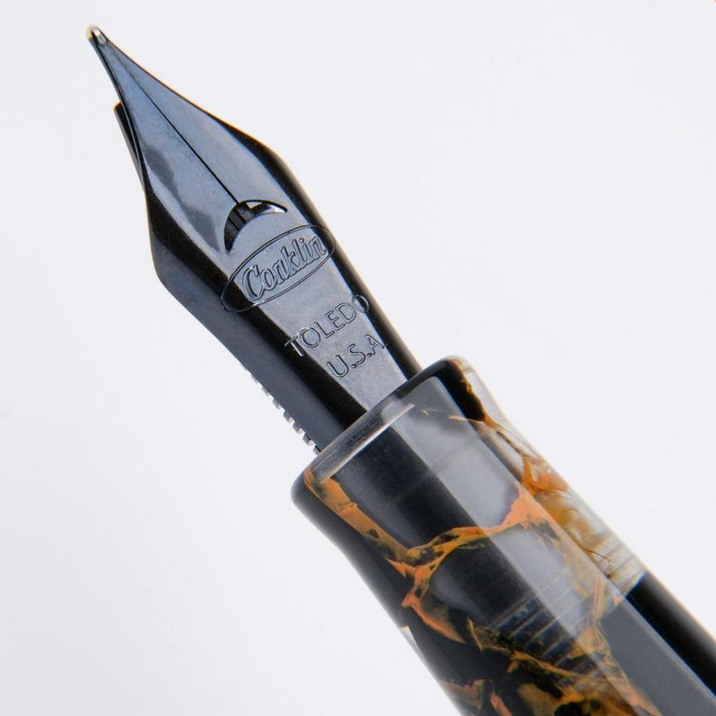 Conklin Mark Twain Crescent Orange Medley with Gunmetal Fountain Pen - Pen Nib Close Up | EndlessPens