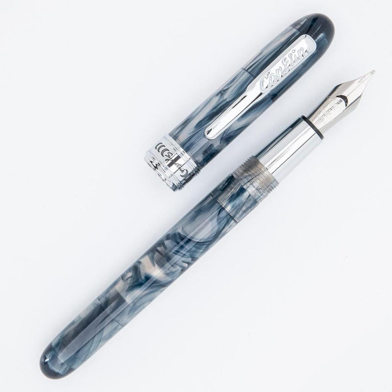 Conklin Symetrik Blue Supernova Fountain Pen - Pen and Cover On White Background Exposing Nib | EndlessPens