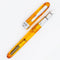Conklin Symetrik Precious Amber Fountain Pen - Pen and Cover On White Background Exposing Nib | EndlessPens