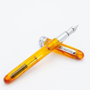 Conklin Symetrik Precious Amber Fountain Pen - Pen and Cap Cover On White Background | EndlessPens