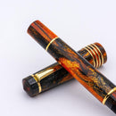 Delta DV Glow Up Oversize Oro Fountain Pen - Pen and Cap Cover on White Background | EndlessPens