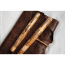 Leonardo × @twenty_sides Momento Zero Grande 2.0 Midas Fountain Pen - Two Pens On Top Of Leather | EndlessPens
