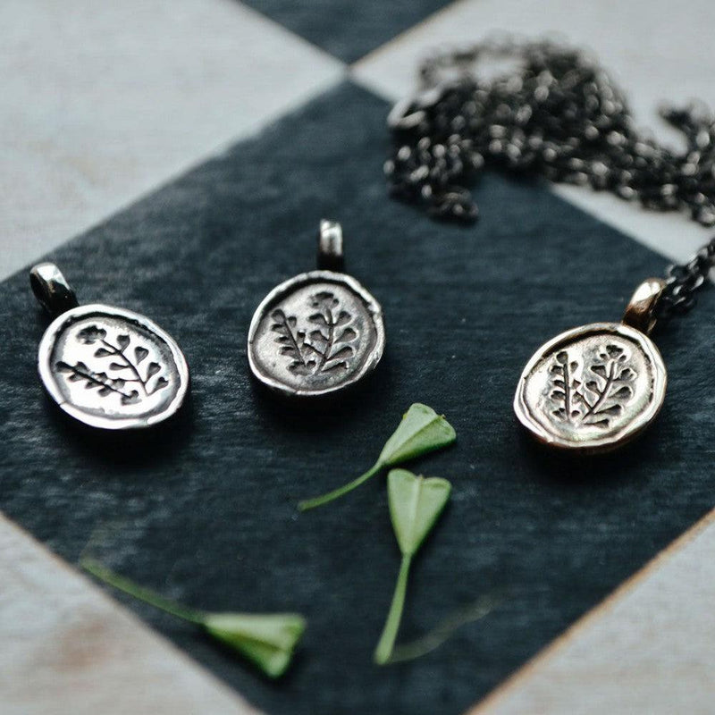 Peg and Awl Shepherd's Purse Botanical Necklace - Three Pendants Together