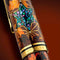 Pelikan M1000 Maki-e Ivy and Komon Fountain Pen - Close Up View Of Cap Cover Design On Brown Background | EndlessPens