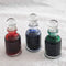 Pennonia Decorative Glass Inkwell - Close Up View Of Three Inkwells With Ink Inside | EndlessPens