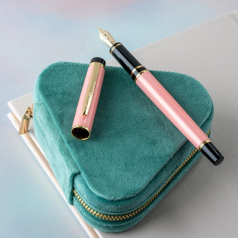 Pilot Grance Fountain Pen - Light Pink On Top Of Notebook and Case | EndlessPens