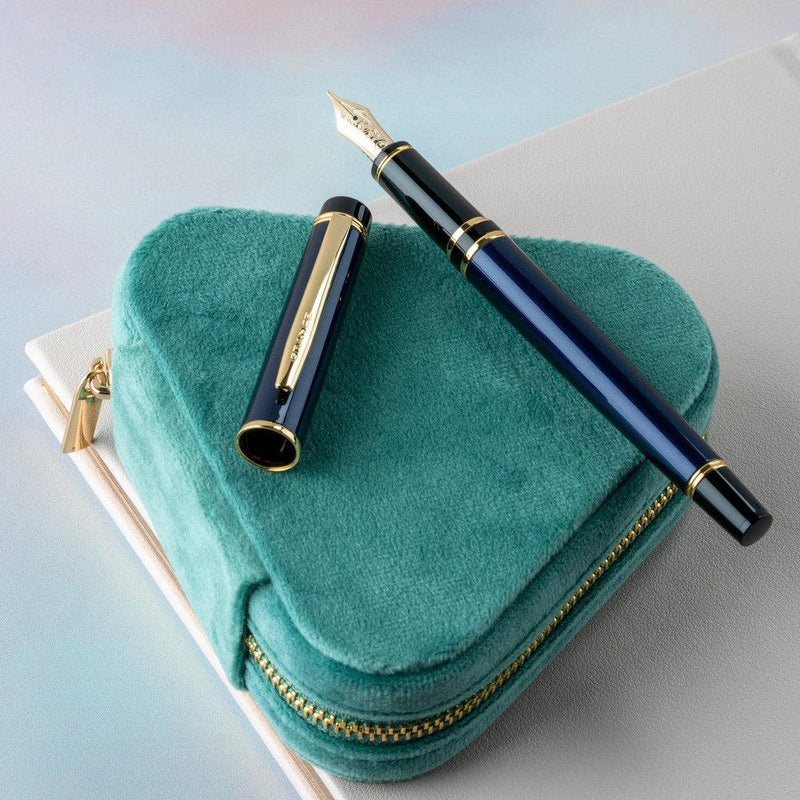 Pilot Grance Fountain Pen - Navy Blue On Top Of Notebook and Case | EndlessPens