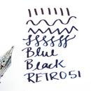 Retro 51 Blue Black Ink Bottle (30ml) - Color Sample With A Fountain Pen Nib On White Background | EndlessPens