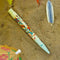 Retro 51 Tornado Popper Beachy Side-Up Rollerball Pen - Pen On Beach Sands Background | EndlessPens