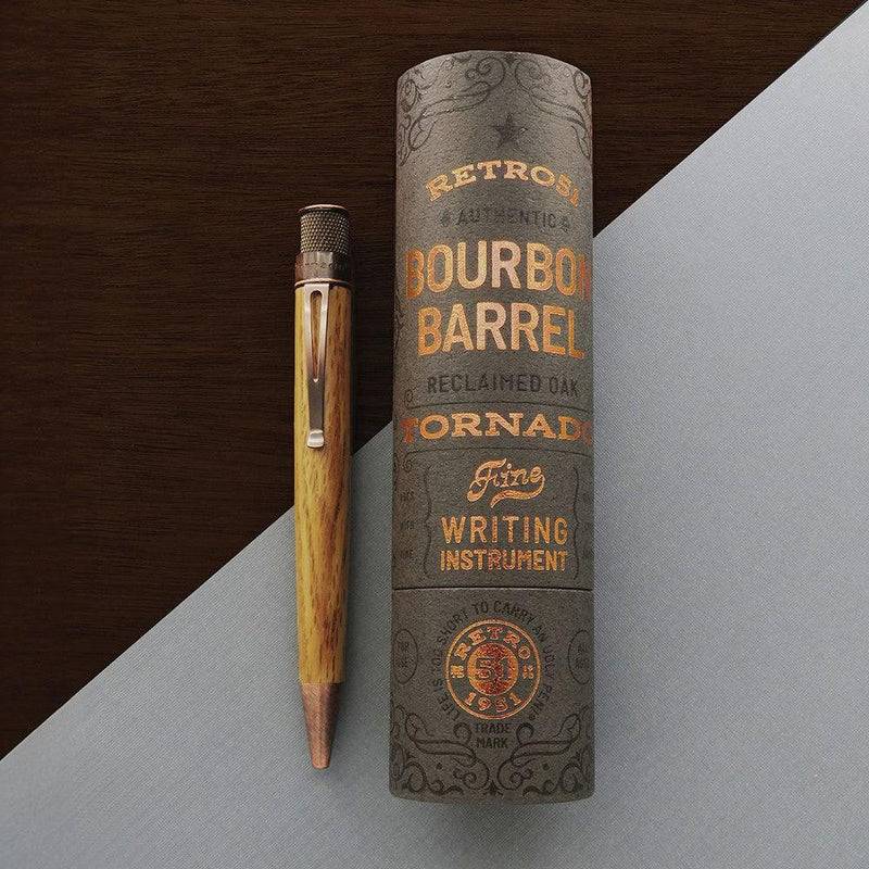 Retro 51 Tornado™ Woodworks Bourbon Barrel Rollerball Pen - Pen And Case On Brown and Gray Background | EndlessPens