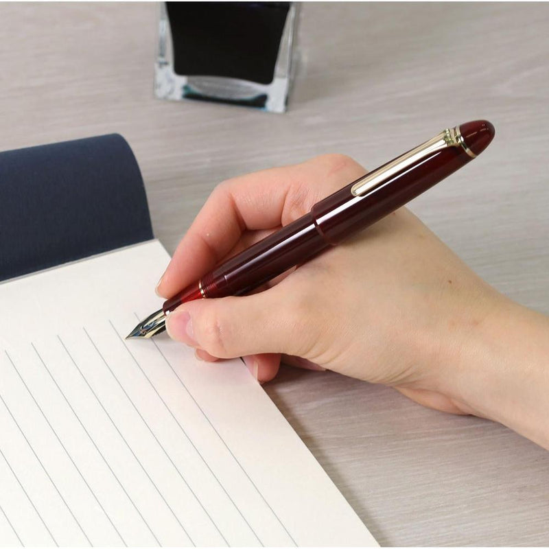 Sailor 1911 Casual L Gold Trim Fountain Pen in Muted Red and Ink and Paper | EndlessPens