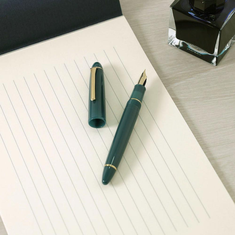 Sailor 1911 Casual L Gold Trim Fountain Pen in Muted Green with Cap Cover Detached with Paper and Ink Bottle | EndlessPens