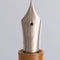 Sailor Veilio 3rd Edition Fountain Pen - Pearl Orange Nib Close Up | EndlessPens