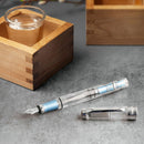 TWSBI Diamond 580AL Iceberg Fountain Pen - Pen With Detached Cap Cover With A Wooden Box And Glass Of Water | EndlessPens