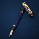 Waterman Man Blue de Paris Fountain Pen - Pen With Cap Removed Exposing Nib On Blue Background | EndlessPens