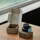 Wearingeul Ink and Pen Rest - Ink Bottle on Ink Rest and a Box | EndlessPens